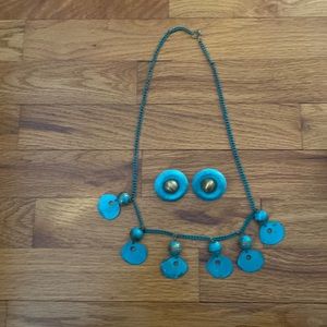 Fun brass 14.5 inches long Necklace with matching earrings with patent mark